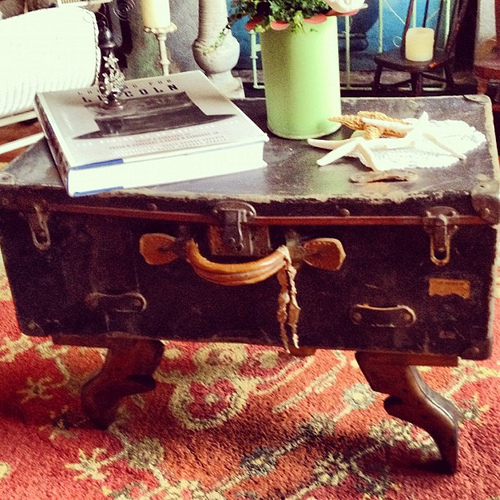 My mom put foot bookends on a suitcase to create a coffee table. BRILLIANT.