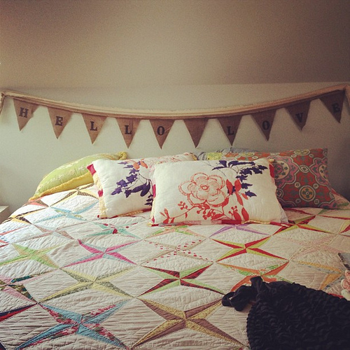 Hello love banner over bed. Love it so much.