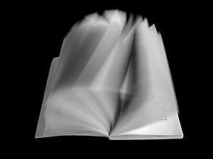 Book photograph with flipping pages. Français ...