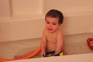 For weeks, the only time he's been happy is in the tub.