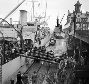 Oil being unloaded from SS Fort Cataraqui at Antwerp, 30 November 1944. (Imperial War Museum)