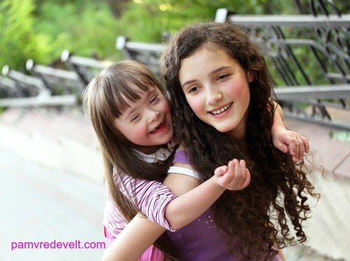 piggy back d.s. girl and mom.jpg