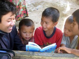 Kit, a first year student in Laos, reading aloud 'Big Brother Mouse'