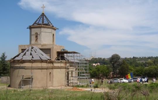 St Andrew\s Church from the east. On the hill opposite is the largest modque in the southern hemisphere.