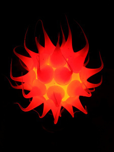 Bulb glowing in a dark room