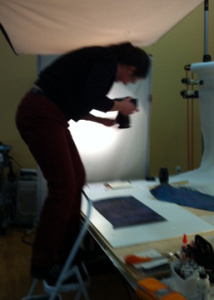 Christine getting a completed piece just right.