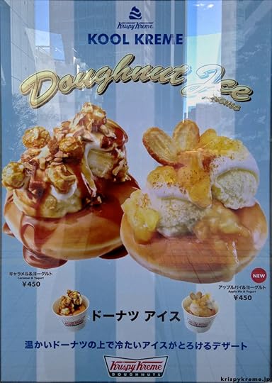 Yes, that's a Krispy Kreme Original Glazed topped with (healthful HAHA) vanilla frozen yogurt, caramel sauce, whipped cream, nuts, and caramel-coated popcorn AIEEEEE!