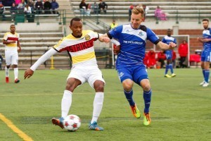 From earlier this season: Fort Lauderdale's Chris Nurse, left, shields the ball from FCE's Neil Hlavaty PHOTO: TONY LEWIS/FC EDMONTON