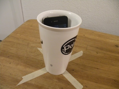 Phone in a cup
