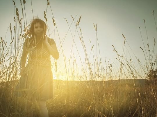 Woman in tall grass