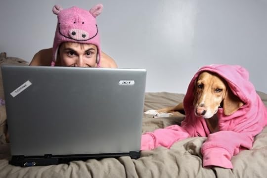 Man and dog on bed