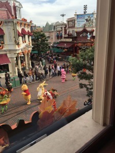 The view of a parade from Walt's Restaurant