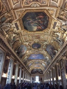 a long hall in the Louvre