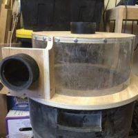 The handles are a dead giveaway as to what this cyclone dust separator is made from.