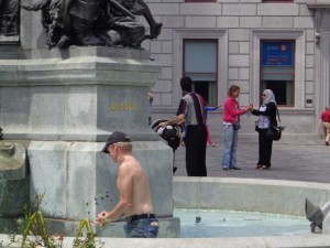 scavenging coins from the fountain outside Notre Dame.