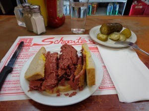 smoked meat on rye with a pickle at Swartz's deli