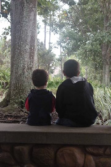 Love this picture. It illustrates so much. This is at Port Orleans Riverside, waiting for the bus.