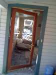 The 2010 Rockfall: In the porch door and out the window.