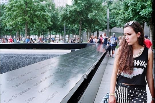 Girl looking haunted at 9/11 memorial