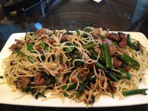 Spaghettini with Italian sausage, broccolini, garlic, basil, and olive oil.