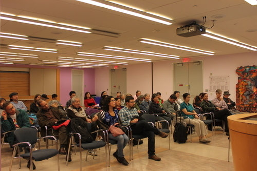 The room is filling up. Wish I had taken the picture of people standing and sitting on the floor. FYI. I didn't put the gentlemen to sleep. They were listening and concentrating. All of them asked me good questions.