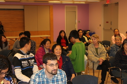Oliver handed out raffle tickets for the gifts. The handsome gentleman is Hassan El-Tayyab, the lead singer in the band American Nomad.