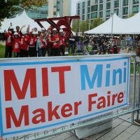 The MIT Mini Maker Faire filled three circus tents on the MIT campus in Cambridge. That's the organizing team in the red shirts, waving. (photo: Joshua Ramos)