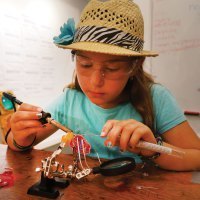 student-soldering