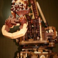 Kinohaguruma’s wooden robotic arm functions using a series of gears and levers