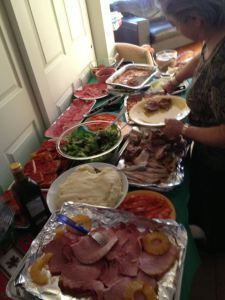 The spread includes mom's pasta and eggplant parmesan, and Akemi's gravlax.