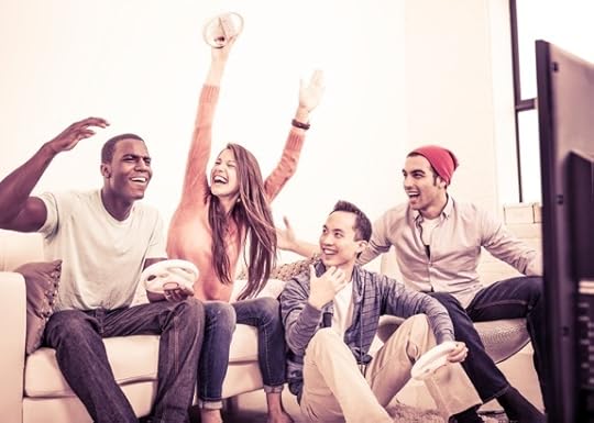 Some Friends Enjoying a Video Game - Photo courtesy of ©iStockphoto.com/ranplett, Image #20557818