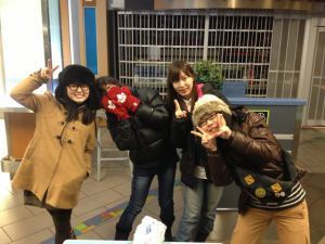 Akemi and co. Yellowknife-bound. Akemi is the one hiding behind the red mitts.