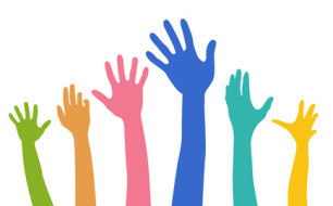 multicoloured hands raised as if voting. Illustration © Creative Stock -- Fotolia.com