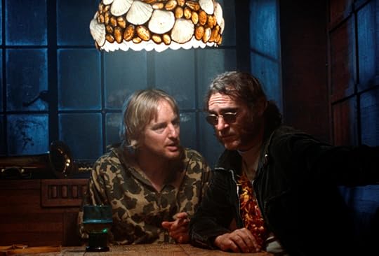 Owen Wilson and Joaquin Phoenix sleuth confusedly in 'Inherent Vice' (Warner Bros.)