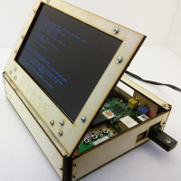 WildCircuit’s Pivena laser-cut case with 7-inch LCD lid and plenty of storage for extra hardware.