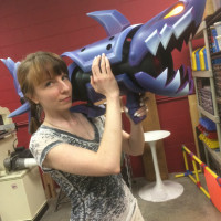 Yep, it’s a shark rocket launcher with a missile locked and loaded- in its mouth