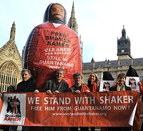 The launch of the We Stand With Shaker campaign outside the Houses of Parliament on November 24, 2014, featuring, from L to R: Roger Waters, Clive Stafford Smith, Andy Worthington, Joanne MacInnes and Caroline Lucas.