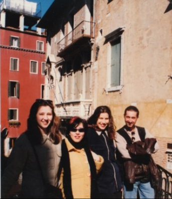 Jen poses with friends in Venice, Italy