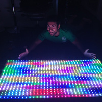 Samy Kamkar, one half of Epoch Rises, showing off the duo's LED panel.