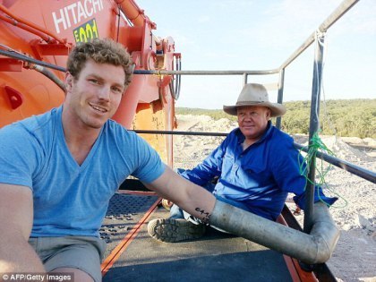 David Pocock chained to a digger