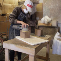 Jessica Banks of Rock Paper Robot, a 2013 Next Top Maker, working in the program's shared space.