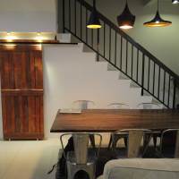 I attached two wheels at the top and another two at the bottom. the railing was secured using the last plank available from the same pallet. Because of the texture, it looks good when I put on the spotlights on top of it.