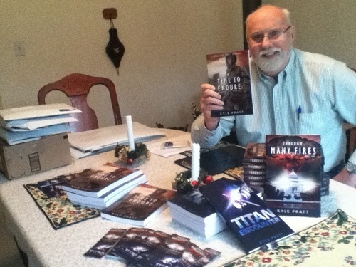 Kyle Pratt signing books