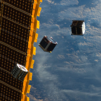 Student-built cubesats are released from the international space station's Kibo module. Credit: NASA