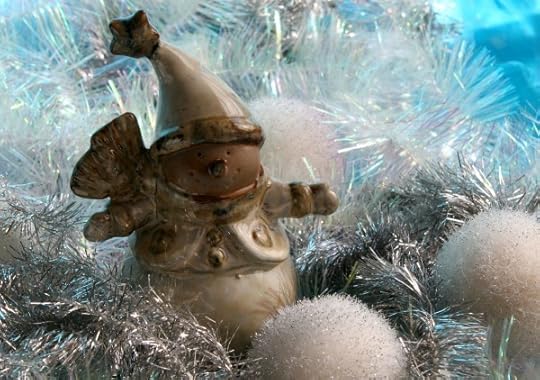 Ceramic snowman with silver tinsel