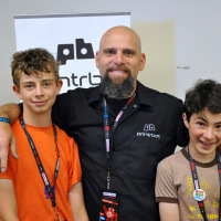 Sam Schickler at Maker Faire Bay Area 2014 with Printrbot's Brooke Drumm and fellow Maker Club student Alexander. Via Tales of a 3D Printer