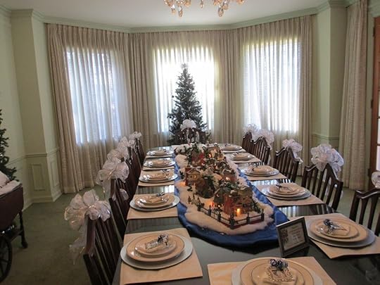 Dining room with a village as the centerpiece of the table