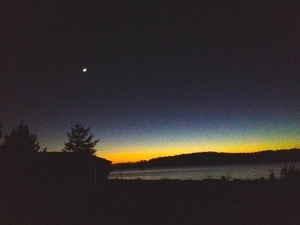 Photo of a sunset over water.