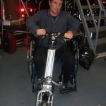 Dan demonstrating an engine to hold on from a wheelchair