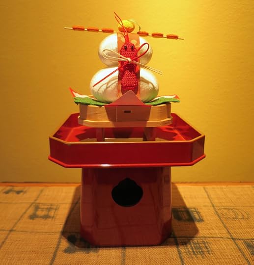 The white things stacked on this lacquer stand are kagami mochi –